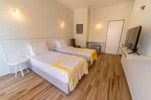 TV a/nebo společenská místnost v ubytování Hotel NEBO