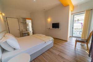 TV a/nebo společenská místnost v ubytování Hotel NEBO