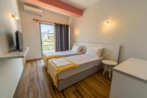 Postel nebo postele na pokoji v ubytování Hotel NEBO
