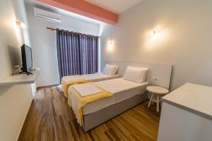 Postel nebo postele na pokoji v ubytování Hotel NEBO