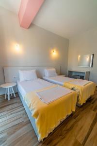 Postel nebo postele na pokoji v ubytování Hotel NEBO