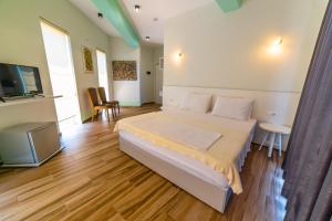 Postel nebo postele na pokoji v ubytování Hotel NEBO