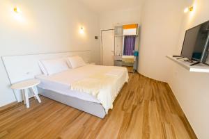 TV a/nebo společenská místnost v ubytování Hotel NEBO