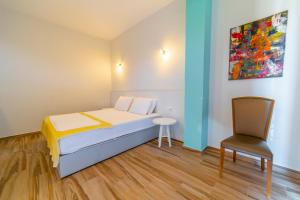 Postel nebo postele na pokoji v ubytování Hotel NEBO