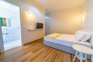 Postel nebo postele na pokoji v ubytování Hotel NEBO
