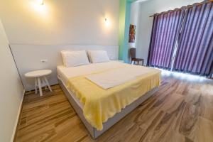 Postel nebo postele na pokoji v ubytování Hotel NEBO