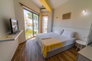 TV a/nebo společenská místnost v ubytování Hotel NEBO