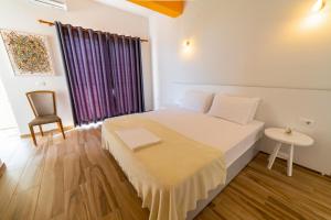 Postel nebo postele na pokoji v ubytování Hotel NEBO