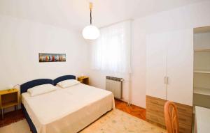 Postel nebo postele na pokoji v ubytování Apartment Pula 45