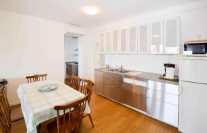 Kuchyň nebo kuchyňský kout v ubytování Apartment Pula 45