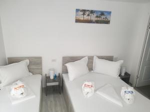 Postel nebo postele na pokoji v ubytování Casa David