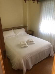 Posteľ alebo postele v izbe v ubytovaní Apartamento con vistas en Baiona