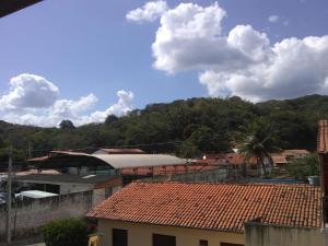 a view of a city with buildings and trees at Pousada & Café da Serra - Pacoti in Pacoti
