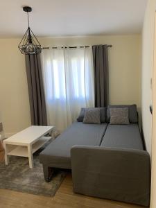 Postel nebo postele na pokoji v ubytování Apartamentos San Lazaro