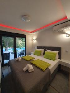 Postel nebo postele na pokoji v ubytování Luxury Villa Magic