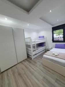 Postel nebo postele na pokoji v ubytování Luxury Villa Magic