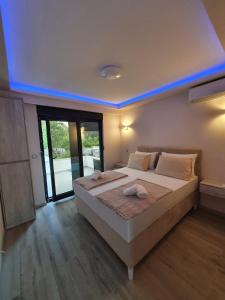 Postel nebo postele na pokoji v ubytování Luxury Villa Magic
