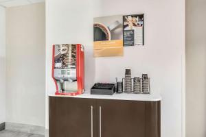 a counter with a sewing machine on top of it at Motel 6-Cleburne, TX in Cleburne