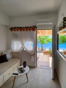 Posedenie v ubytovaní Sea Sound Haraki apartment