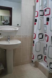 Kylpyhuone majoituspaikassa Africana Hotel
