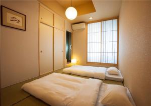 谷町君・星屋・城下の宿 객실 침대