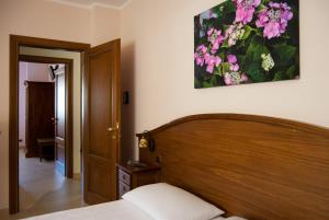 Postel nebo postele na pokoji v ubytování B&B Angela