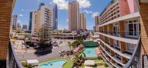 a large building with a view of the city at Bunk Surfers Paradise in Gold Coast