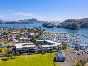 an aerial view of a harbor with a marina at Marina Park Apartments Whitianga in Whitianga