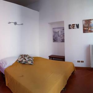Posteľ alebo postele v izbe v ubytovaní Le 5 vie, lago Maggiore
