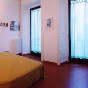 Posteľ alebo postele v izbe v ubytovaní Le 5 vie, lago Maggiore