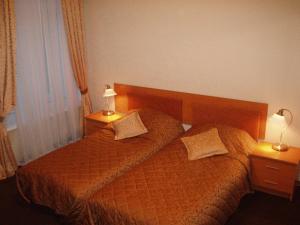 Cama o camas de una habitación en Nevsky Guest House