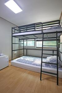 Двуетажно легло или двуетажни легла в стая в Dashim Guest House