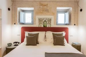 Postel nebo postele na pokoji v ubytování Borgo dei Lecci Puglia + 37 fotografií
