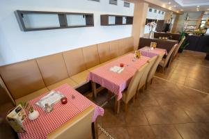 an overhead view of a restaurant with two tables and chairs at Penzion Toscana in Nitra +44 photos