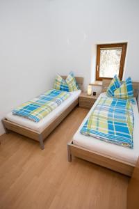 Postel nebo postele na pokoji v ubytování Samonigghof