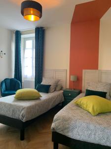 a bedroom with two beds and a window at MAISON BEAUMONT in Le Verdier +45 photos