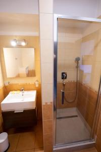 Kylpyhuone majoituspaikassa Penzion Toscana