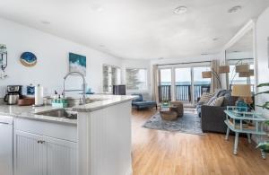 A kitchen or kitchenette at New Listing Beach Bliss 211! Stunning bay view