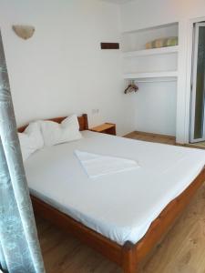 Postel nebo postele na pokoji v ubytování Vila Cata Costinesti