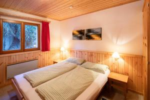 Ένα ή περισσότερα κρεβάτια σε δωμάτιο στο Chalet Annabelle