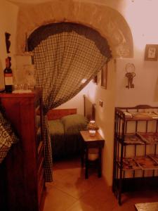 Postel nebo postele na pokoji v ubytování Miratrulli Apartment & Trullo dell'Aia