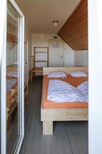 a bedroom with a bed and a desk at Dom na Slivnici in Cerknica