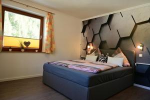 Voodi või voodid majutusasutuse Appartement Wanneck toas