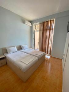 Letto o letti in una camera di SBakuri
