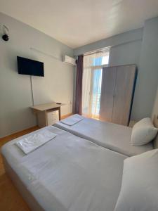 Letto o letti in una camera di SBakuri