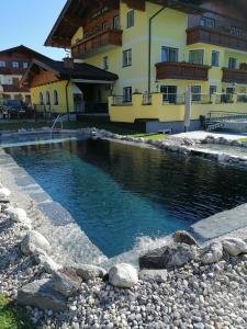 The swimming pool at or close to Landhaus Huber