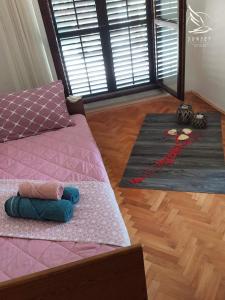 Katil atau katil-katil dalam bilik di Sunset Apartment
