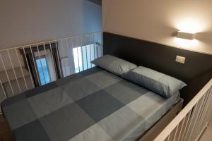 A bed or beds in a room at RESORT REIS country house