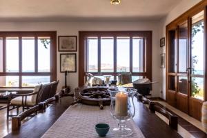 Posezení v ubytování Villa Curiazzi Guesthouse Viale la Pelosa 16