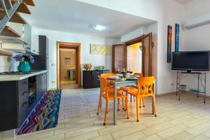 Μια τηλεόραση ή/και κέντρο ψυχαγωγίας στο Casa vacanze Sardegna il Corbezzolo